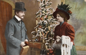 Vintage Christmas card circa 1915 shows the turn-of-the-century Christmas tree in Europe where most trees were 4ft tall. It was in the United States where trees from floor to ceiling were used.